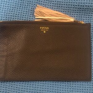Fossil women black Leather pouch with white tassels with snap on.